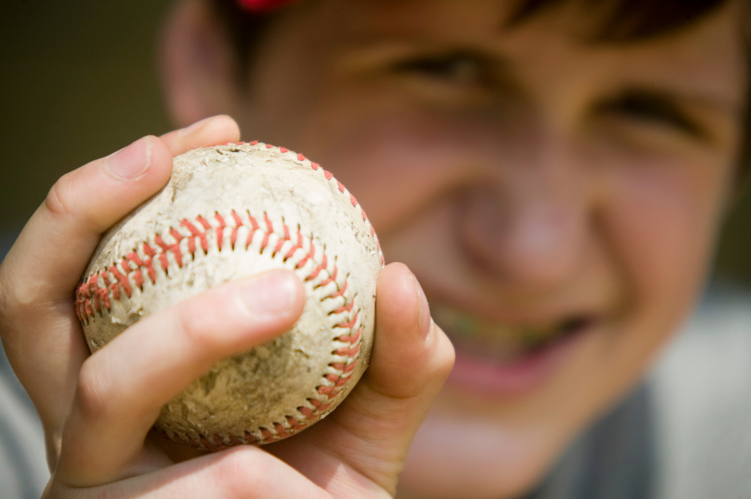 Baseball player holding ball